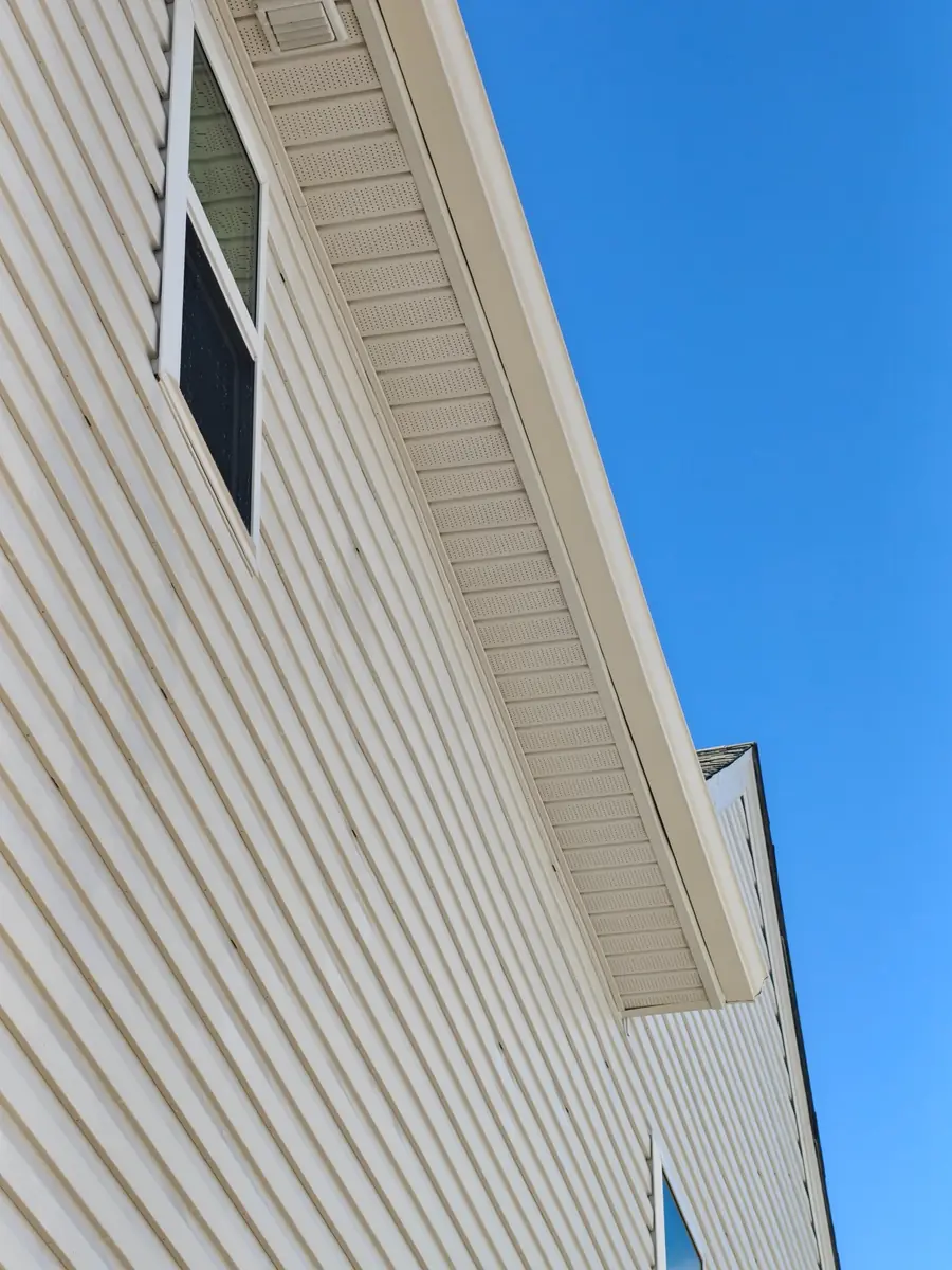 Clean soffit and gutter line on a home in Concord, NC after gutter brightening